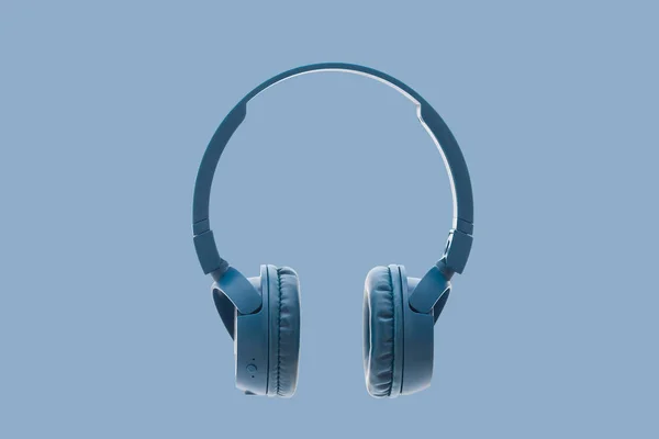 蓝色背景工作室包拍摄设备蓝牙蓝色耳机 — 图库照片