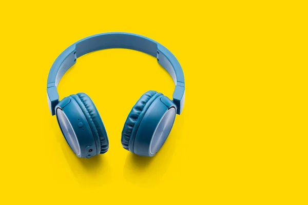 Bluetooth Blue Headphone Yellow Background Studio Packshot Equipment Stok Lukisan  