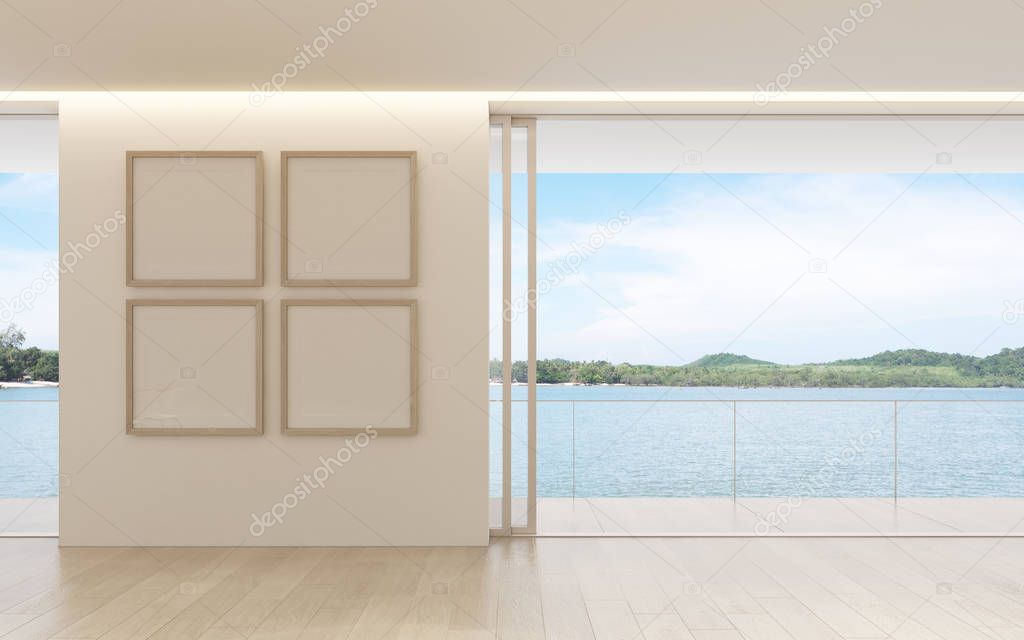 View of living room in minimal style with  picture frame on white wall and sea view background.. 3d rendering.