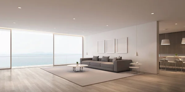 Perspective of modern luxury living room with grey sofa and white picture frame and dining table set on sea view background,Idea of family vacation - warm timber interior design - 3D rendering.