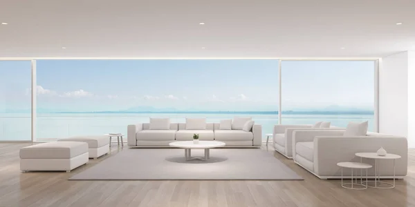 Perspective of modern luxury living room with white sofa on sea view background,Relaxation idea of family vacation, architecture idea of large window system - 3D rendering.