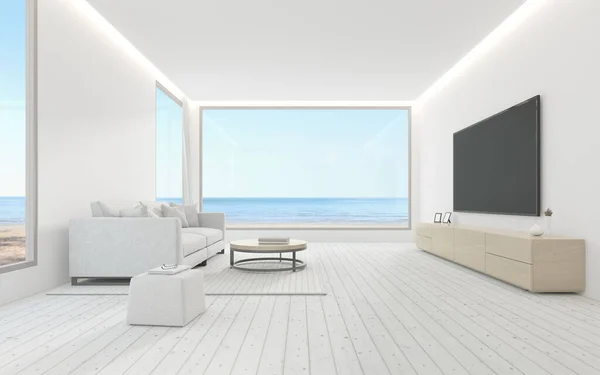 3D rendering of modern living room with TV screen and sofa on sea background.