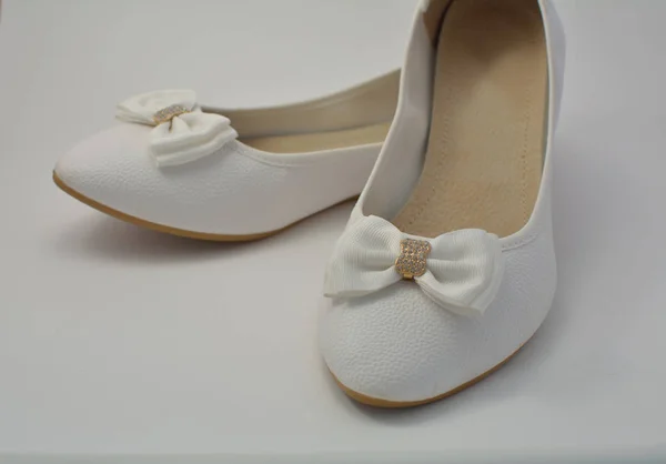 A white female shoes with a bow — Stock Photo, Image