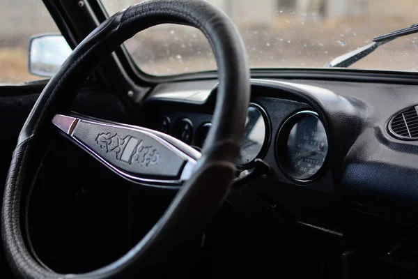 Black control panel in a Russian car with a steering wheel