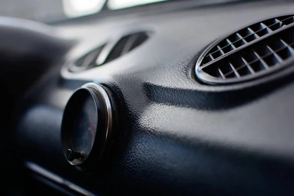 Black control panel with heater grilles and a clock with hands in an old Russian car — Stock Image Black Control Panel Heater Grilles Clock Hands Old Russian Car Stock Image