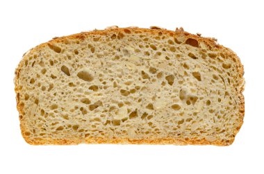 Yukarıdan dilimlenmiş ekmek. Kahverengi mayalı ekmek, hecelenen un, yapraklı, ayçiçeği çekirdeği ve baharat karışımı, fırında pişirilmiş. Zımba. Yakın plan, beyaz arka plan, izole edilmiş makro yiyecek fotoğrafı.