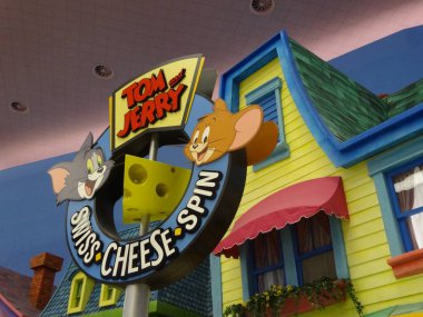 Abu Dhabi - May 2019: Tom & Jerry Cheese Spin Coaster At Warner Bros World clipart
