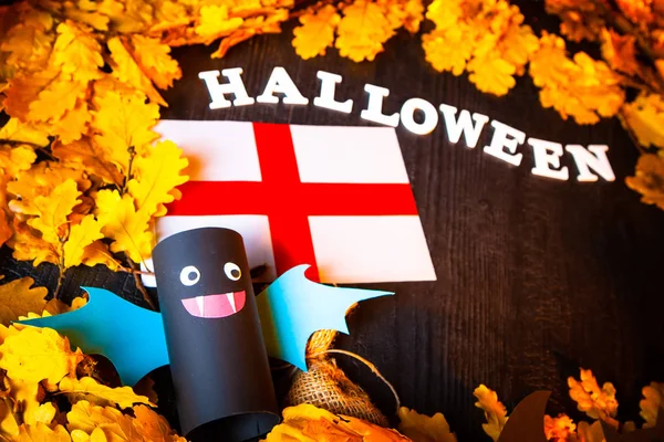 Holiday Halloween. England Autumn holiday. Vampires against the background of yellow leaves. Decoration for the holiday of Halloween in England. flag of England.