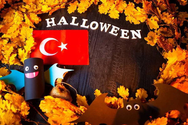 Holiday Halloween. Turkey. Autumn holiday. Vampires against the background of yellow leaves. Decoration for the holiday of Halloween in Turkey. flag of Turkey.