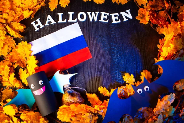 Holiday Halloween. Russia. Autumn holiday. Vampires against the background of yellow leaves. Decoration for the holiday of Halloween in Russia. Flag of Russia.