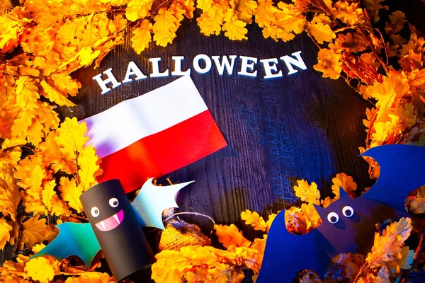 Holiday Halloween. Poland. Autumn holiday. Vampires against the background of yellow leaves. Decoration for the holiday of Halloween in Poland. flag of Poland.