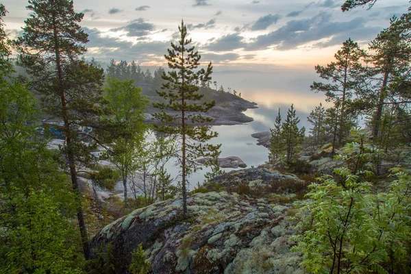 Russia. Karelia. Mirror reflection in water. Stones in the water. Ladoga lake. Karelia. Islands from a height. Ladoga lake. — Stock Image Russia Karelia Mirror Reflection Water Stones Water Ladoga Lake Karelia Stock Photo