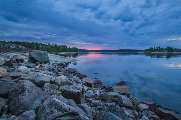 Russia. Karelia. Mirror reflection in water. Stones in the water. Ladoga lake. Karelia. Islands from a height. Ladoga lake. — Stock Image Russia Karelia Mirror Reflection Water Stones Water Ladoga Lake Karelia Stock Picture