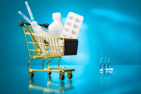 Purchase of medicines. Medical preparations in a shopping cart. Prices for medicines. Drugs in the cart.