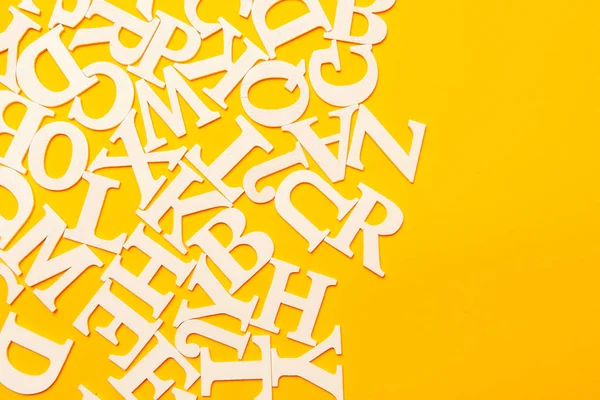 English letters on a yellow background. English letters. English alphabet.