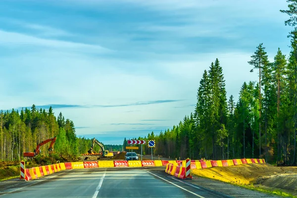 Road repair. Repair of asphalt road. Detour road section with repair.