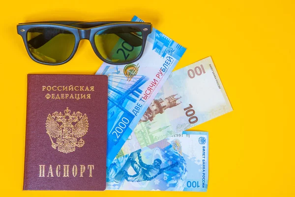 Passport and money of Russia. Journey through Russia. Money for rest and travel. Russian passport with money.