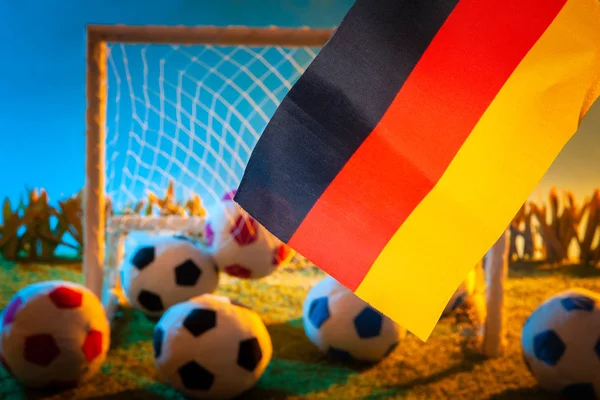 Flag of Germany. Football. Flag of Germany at the stadium. Football game. Germany national football team. Soccer ball in the stadium. Football pitch.