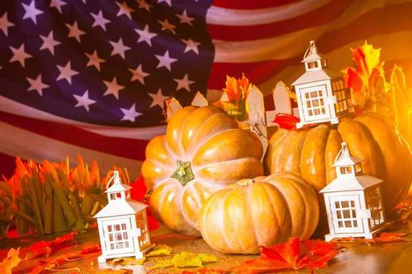 American flag. Pumpkins. Autumn in America. A rich harvest of pumpkins. Halloween.