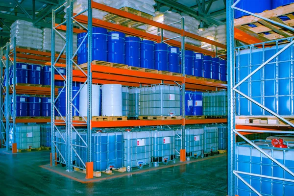 Plastic barrels. Blue barrels. Chemistry. Chemical storage. Recycling chemistry.