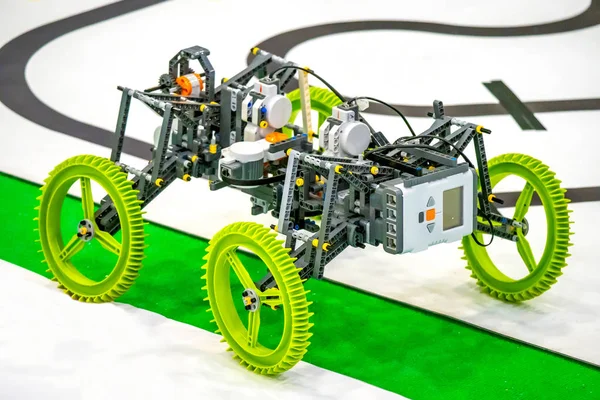 Machine robot on wheels. Homemade machine with artificial intelligence. Robotic car. Machine control according to the program of artificial intelligence.
