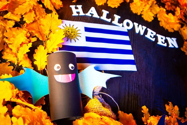 Halloween holiday. Decoration for the holiday. Vampires. Autumn holiday. Halloween in Uruguay. flag of uruguay.