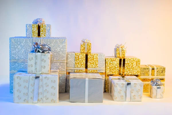 Presents. Decorated boxes with gifts. New Year. Christmas. Holidays. Christmas Eve. Birthday. Give gifts.