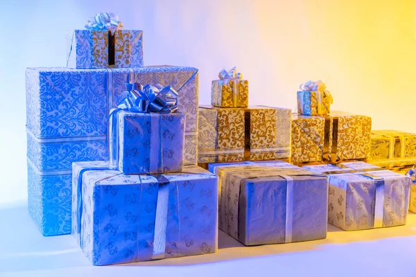Presents. Decorated boxes with gifts. New Year. Christmas. Holidays. Christmas Eve. Birthday. Give gifts.