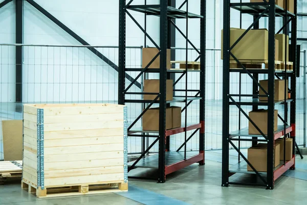 Stock. Postage Shipment. Metal rack for storage of goods. Shelves with boxes. Storage. Storage system Cardboard boxes.