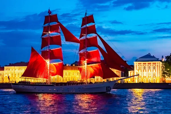 Saint Petersburg. Holiday Scarlet Sails. Russia. Evening Petersburg. Sailboat sailing on the Neva River. Holidays in the Russian Federation. Sailboat with scarlet sails. Summer evening.