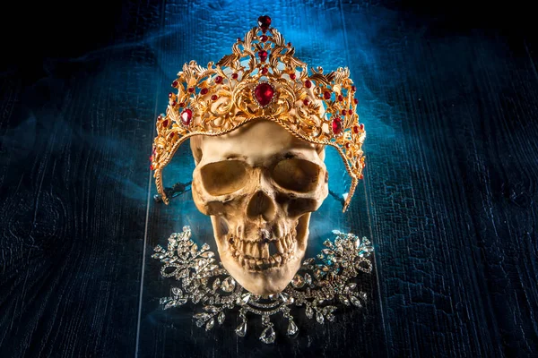 Skull in the crown. Skull in ornaments. Skull with female orname