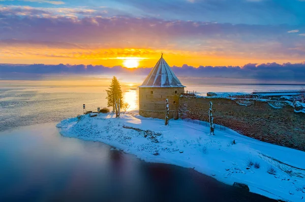Saint Petersburg. Russia. Snow-covered fortress Oreshek at sunse