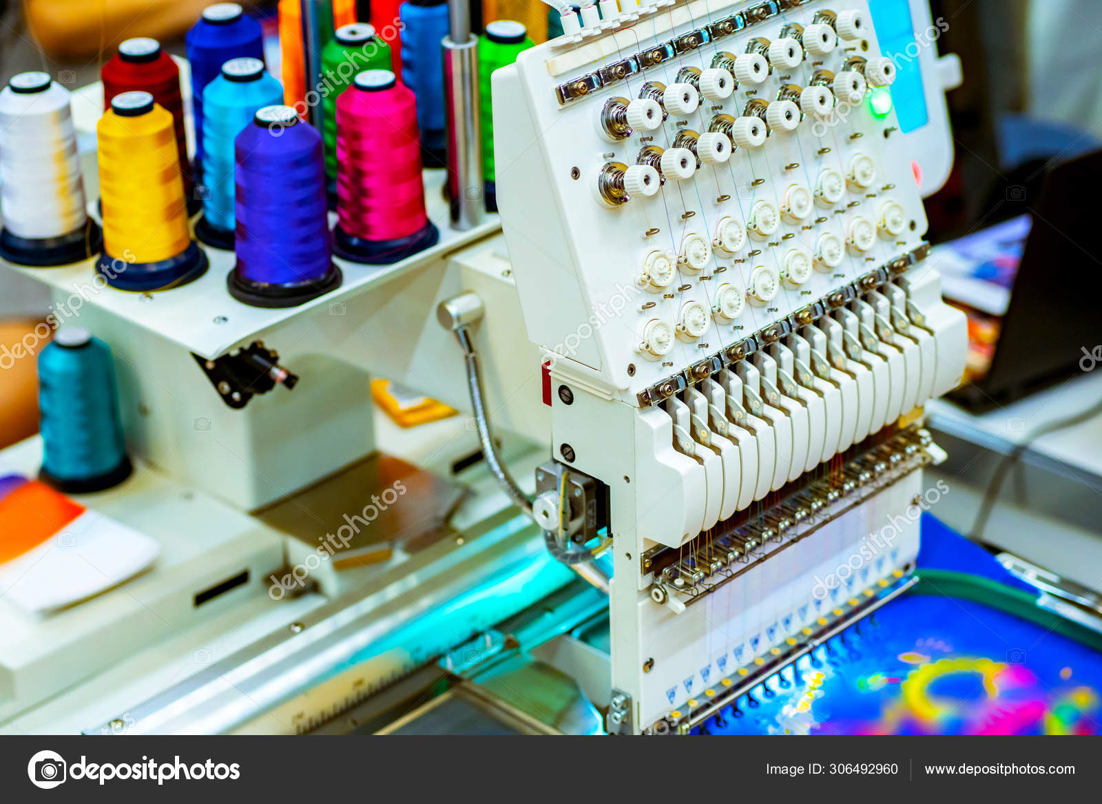 Professional embroidery machine. Needlework machine with compute