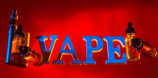 Vape logo on a red background. The vape logo next to the electronic cigarette. Oils for vaping. The word vape soars through the air. Liquid for a vaping device. Accessories for the vaper.