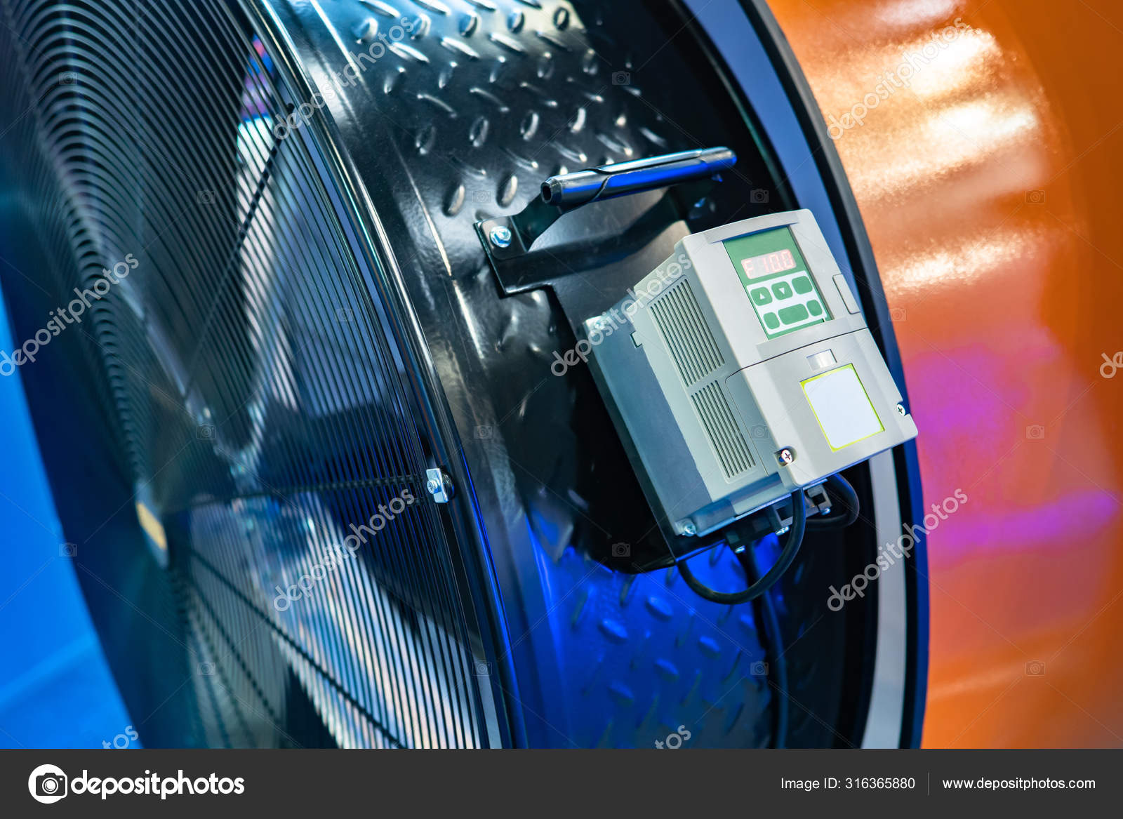 Forced ventilation. Industrial fan control unit. A control module is installed on the fan