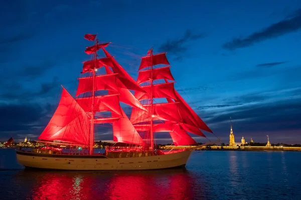 Saint Petersburg. Russia. Scarlet sail. A ship with scarlet sails on the Neva. Celebration of school graduates. White nights of St. Petersburg. Rivers Of Petersburg.