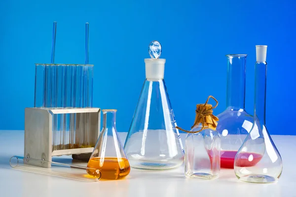 Medical laboratory. Flasks with reagents. Bacterial studies. Sale of chemicals. Glass beakers. Minorski on the table in the laboratory. Scientific research. Laboratory work. Chemist. Biology.