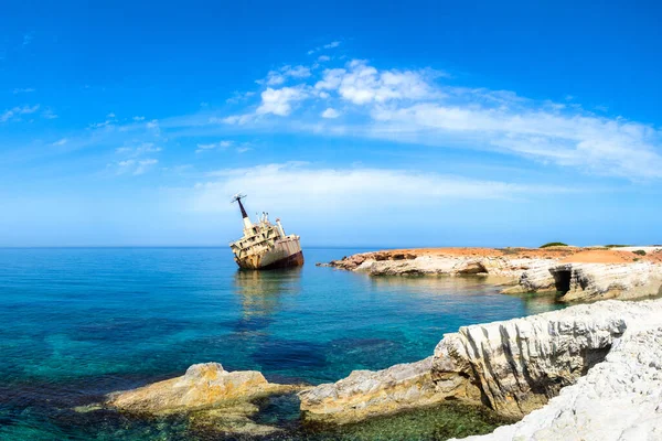 Cyprus beach. Paphos. Broken ships off coast of pathos. Abandoned ship in mediterranean sea. Travel to the city of Paphos. Tours in Cyprus. Holidays in Paphos. Remains of the vessel off the coast.