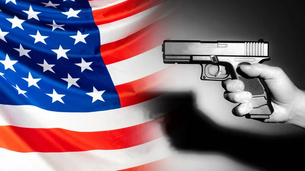 Mass shots in the USA. Man with a gun on the background of the flag of United States. Concept - disputes about the free carrying of weapons. Law on the free acquisition of firearms. Murder in America