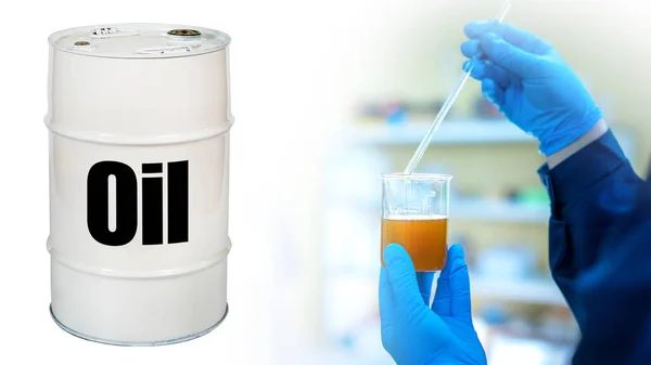 White barrel with the words oil. Crude oil barrel on a white background. Chemical analysis. Oil quality verification. Evaluation of the quality of hydrocarbons in the laboratory. Gloved lab assistant