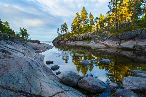 Russia. Karelia. Karelian skerries. lake Ladoga. Channel of lake Ladoga with stony banks. Northern nature. Travel to Karelia. — Stock Image Russia Karelia Karelian Skerries Lake Ladoga Channel Lake Ladoga Stony Royalty Free Stock Photos