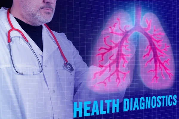 Diagnosis of lung health. Human lungs are depicted on a virtual screen. Doctor examines a patient lung image. Diagnosis of human organism. Diseases of respiratory system. Human respiratory organ.