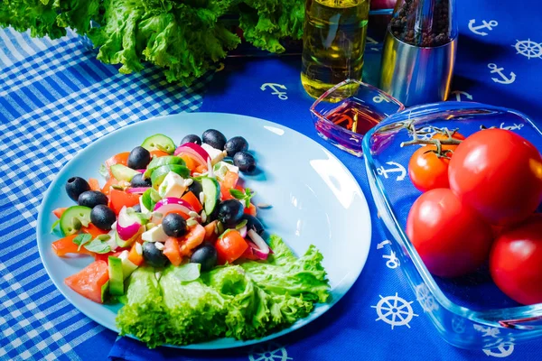 Greek salad on a plate. Greek salad recipe. Recipes Of The Mediterranean. Wholesome food. Snack. Table setting. Dishes from different countries.