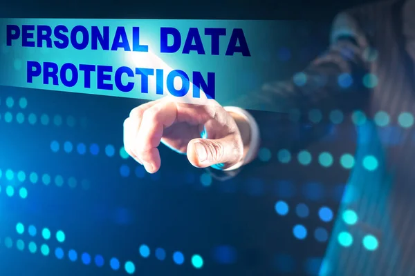 Concept of personal data protection. The businessman activates the protection of confidential personal data. The man presses the personal data Protection button on the touch panel.