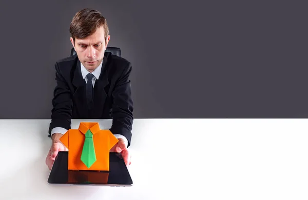 Employment in the company. The personnel Manager has found the right person for the job. HR manager holds out a symbolic origami figure. Frame concept with space for text.