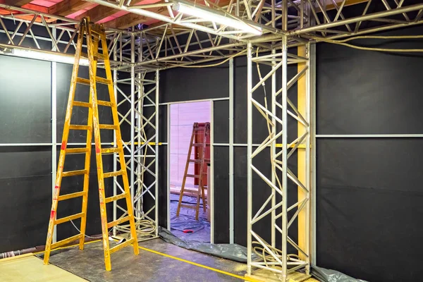 Installing partitions in an office space. Zoning of space. Dividing a large room into rooms. Repair work in the office. Services of construction teams.