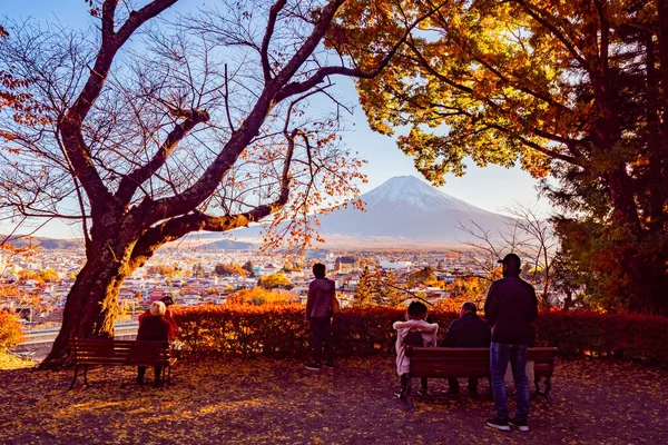 People are admiring Fuji. Autumn in Japan. Japanese and tourists on the observation deck in Kawaguchi. Vacation in Kawaguchiko. Five lakes of Kawaguchiko. Natural attractions in Japan.
