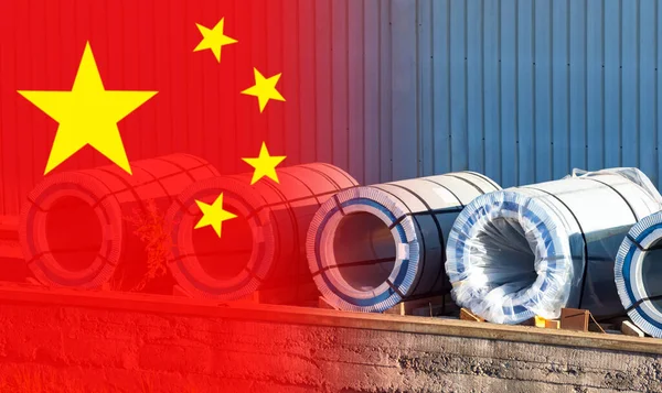 China flag next to rolls of steel. Steel rolls in open air. Concept - export of metal from China. Purchase of metal from People\'s Republic of China. Export of metal from PRC. Wholesale of steel.
