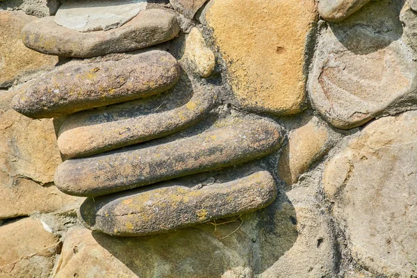 Ausgekleidete Wand Aus Runden Steinen — Stockfoto