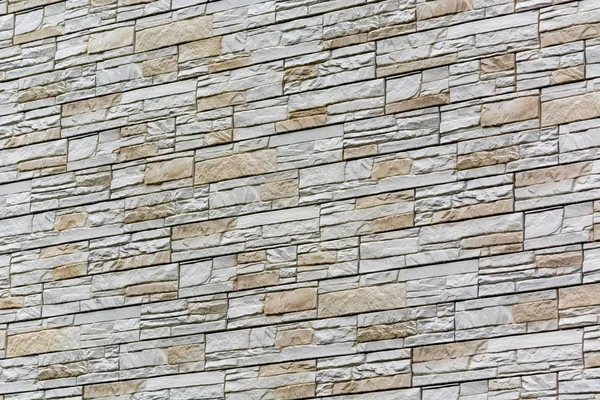 A beautiful wall of white bricks.